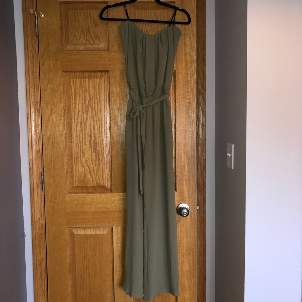 Strapless green jumpsuit with belt